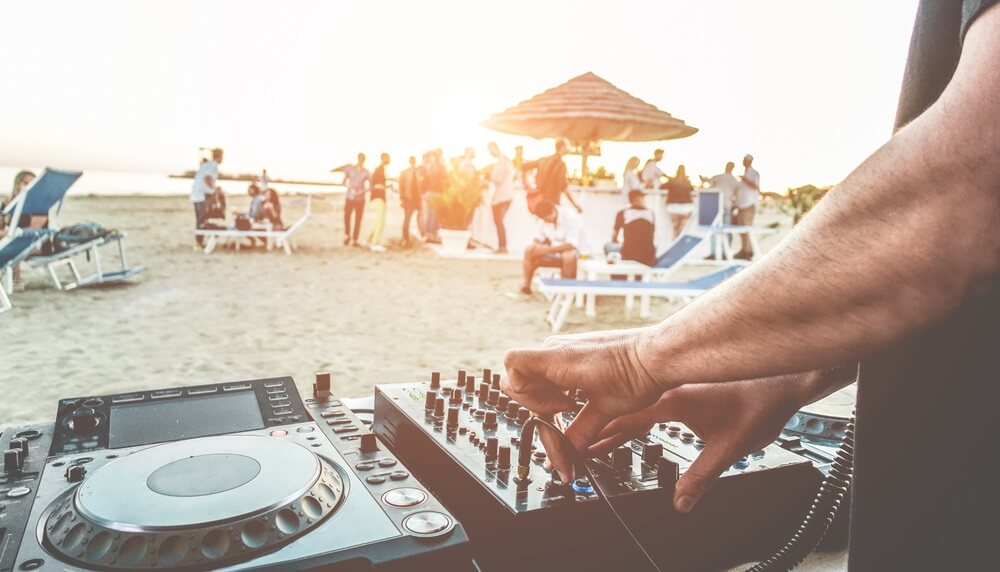 event at the beach with dj