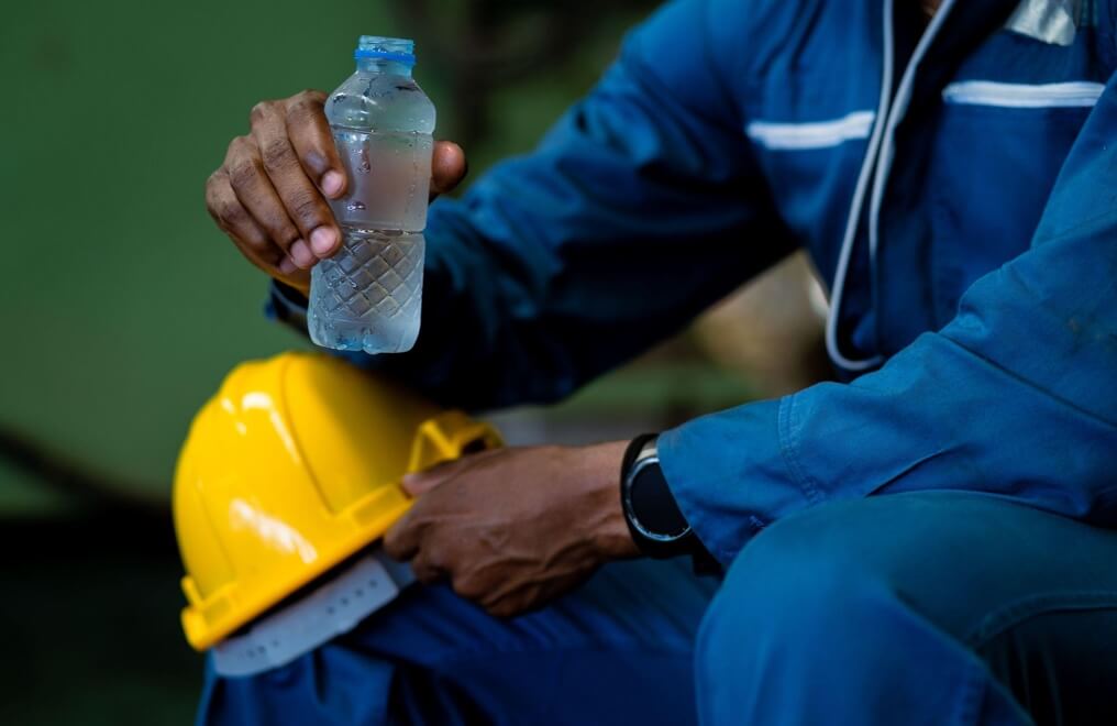 Worker drinking water during a break